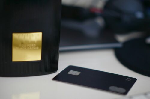 selective focus photography of black card on white table