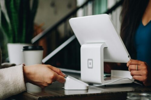 white monitor on desk
